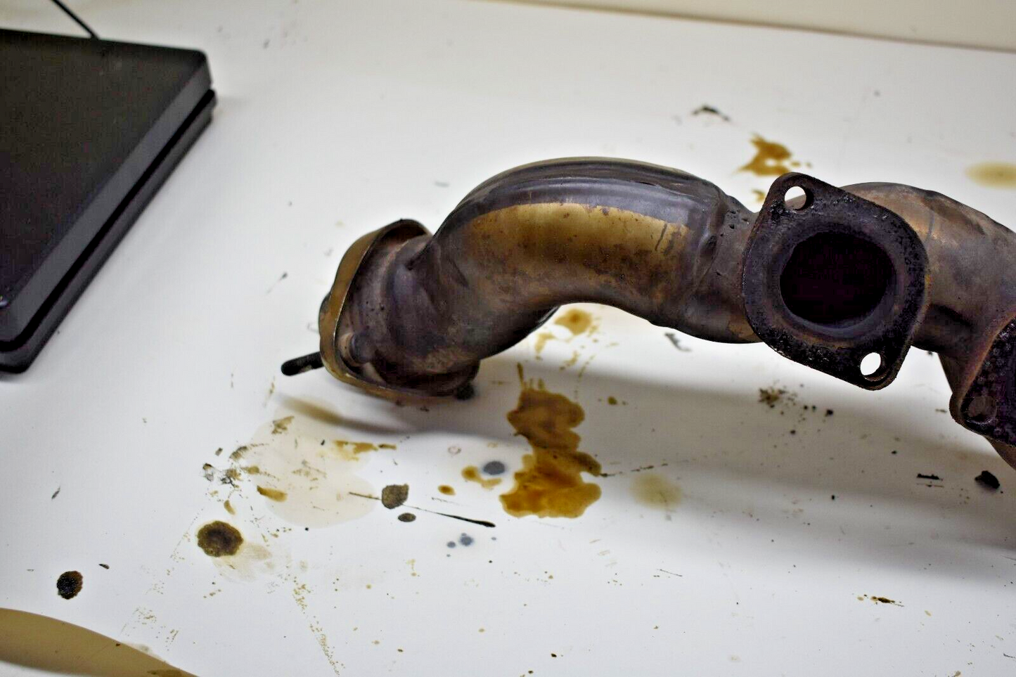 2003 BMW X5 4.4i Left exhaust manifold 11627525077